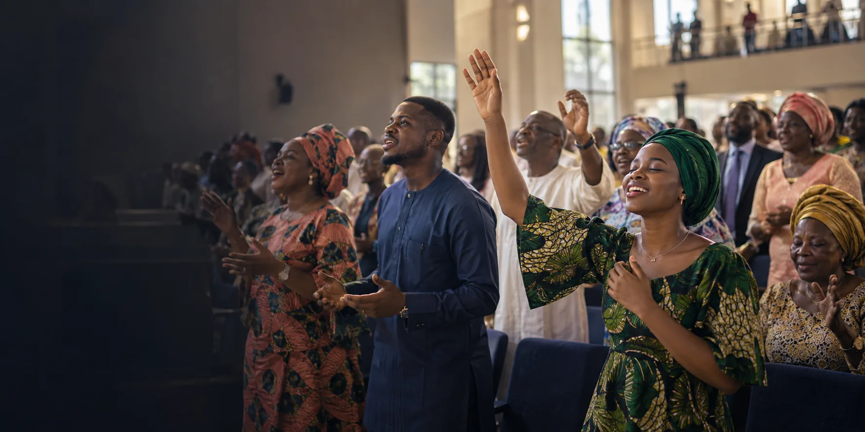 A multigenerational Nigerian congregation worshipping together
